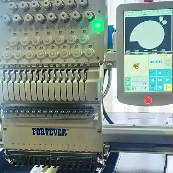 Close up view of one of Cotton Polly's embroidery machine's control panel